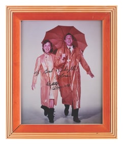 A “Singin’ in the Rain" Photo Signed by Debbie Reynolds.