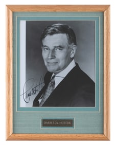 A Charlton Heston Signed Headshot.