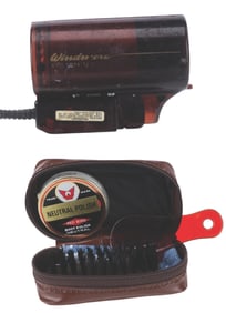Clint Eastwood's Mini Hair Dryer and Shoe Polish Kit.