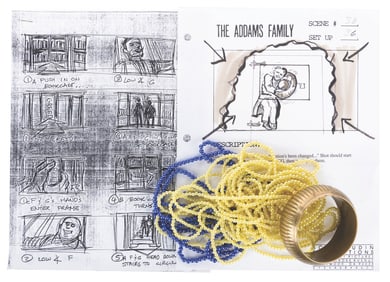 “The Addams Family" Original Storyboard Page and Prop Jewelry.