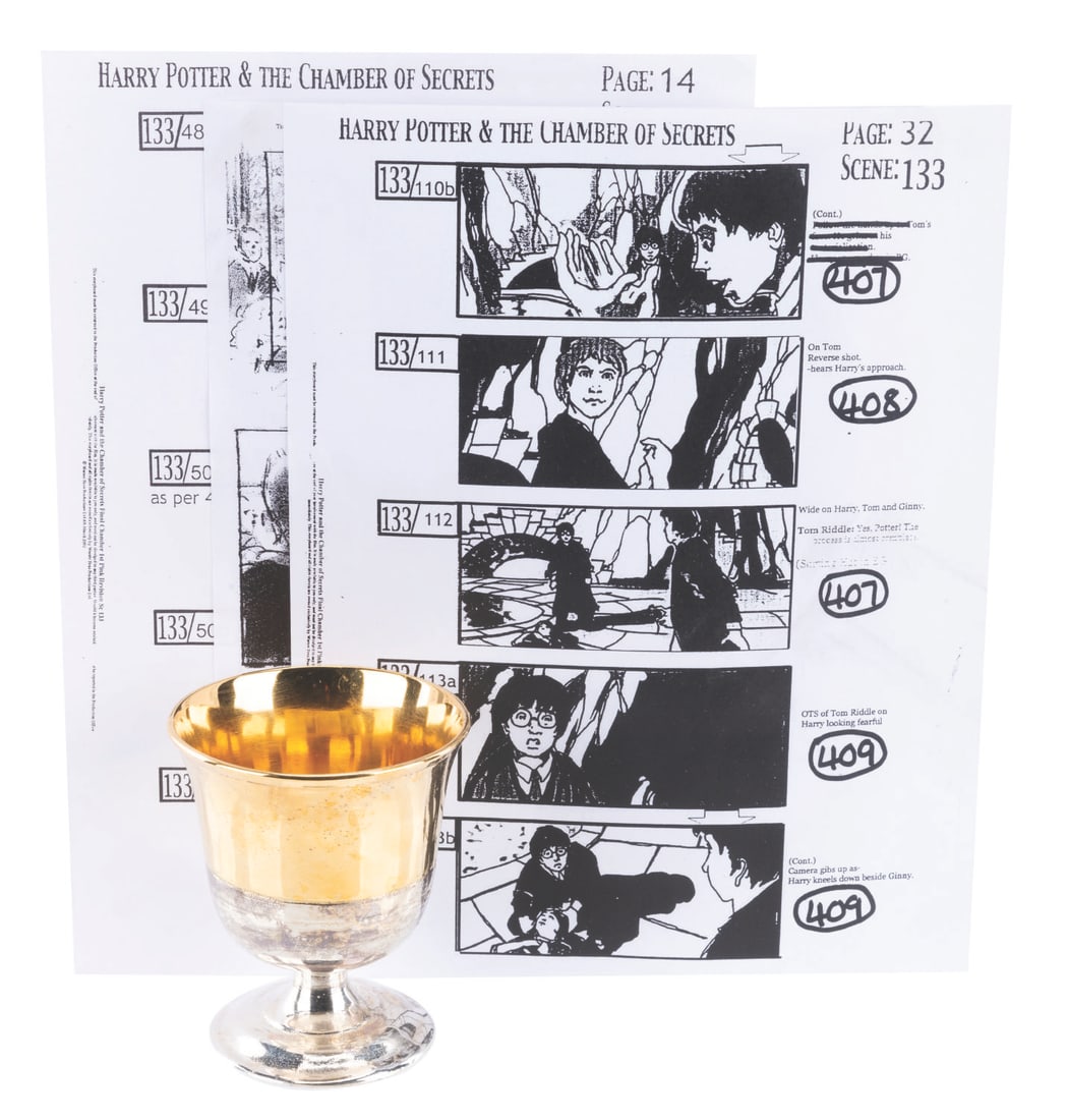 A Goblet Prop and Production Documents from Harry Potter.: (Warner Bros., 2001) A Hogwarts Great Hall goblet prop and crew documents from production of “Harry Potter and the Chamber of Secrets.” The documents include an advance transportation schedule