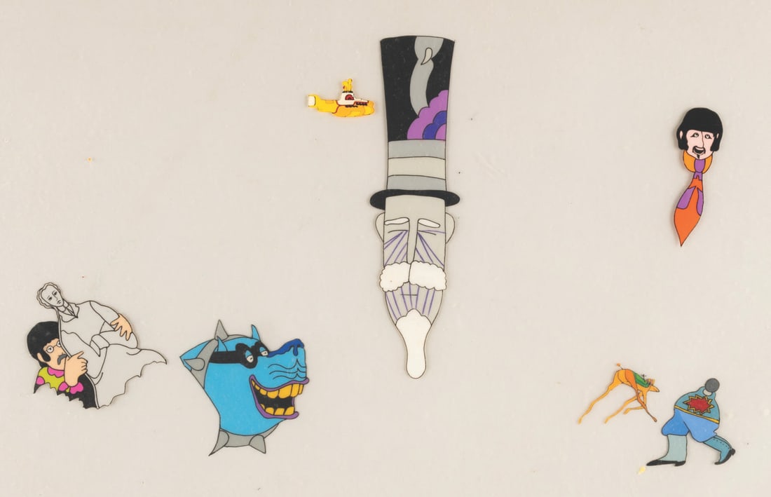A “Yellow Submarine" Multiple Character Production Cel.: (United Artists, 1968) An original multi-layer hand-painted production cel of the Four-Headed Dog, George Harrison, John Lennon, a Horse Monster, the Suckophant, and the Lord Mayor from “Yellow Subm