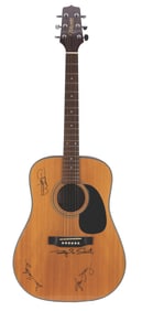 An Eagles Signed Acoustic Guitar.