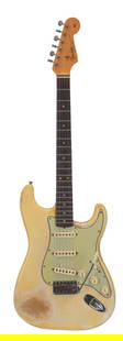 Leon Russell's 1963 Fender Stratocaster Guitar.: (Fender, 1963) Leon Russell’s 1963 Fender Stratocaster. A talented songwriter and musician, Russell played with countless legends over his 60-year career including Bob Dylan, Frank Sinatra, Elton Jo