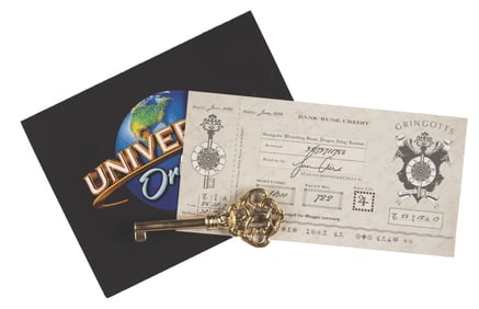 A Wizarding World of Harry Potter VIP Preview Invitation, Gringotts Bank Note, and Vault Key.