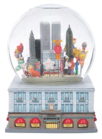 A Macy's Thanksgiving Day Parade Snow Globe.