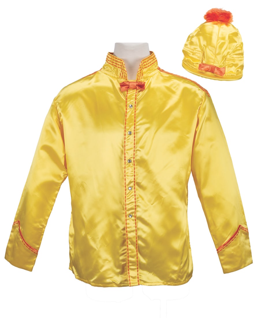 Jay Ward's Chief Bullwinkle Jockey Silk and Cap.: (Anne Roper Racing Colors, 1960s-80s) Jay Ward’s personal Chief Bullwinkle jockey silk and poof-ball cap. A horse racing enthusiast, Ward founded Bullwinkle Stable and hired the legendary Bill Shoem