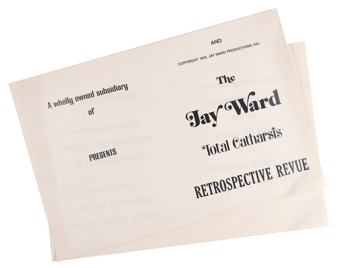 A Pair of Title Stats for “The Jay Ward Total Catharsis Retrospective Revue.: (Ward, 1979) A pair of title stats for “Jay Ward’s Total Catharsis Retrospective Revue.” Each stat containing two rows of text measures 18” x 12” and are both in good condition w