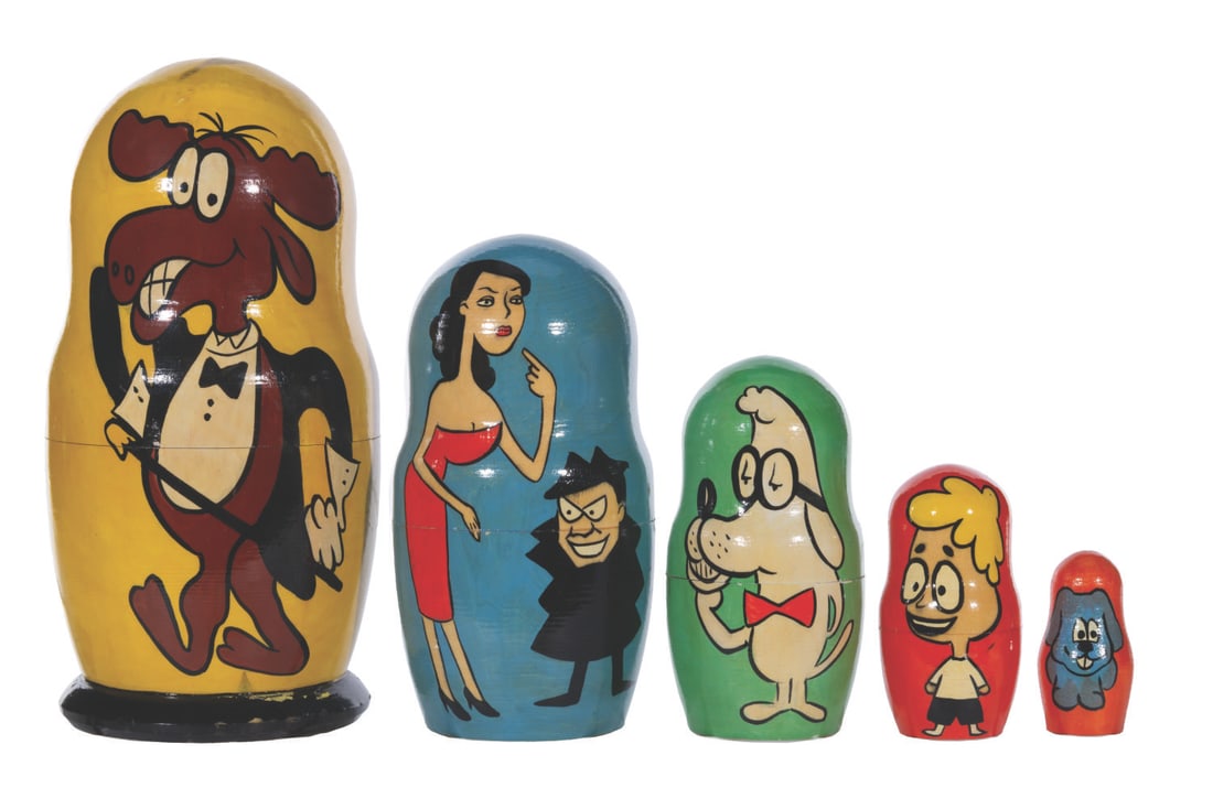 A Rocky and Bullwinkle Russian Nesting Doll.: (Ward, 1960s-80s) A hand-made and painted Russian Matryoshka Nesting Doll, featuring Bullwinkle, Boris and Natasha, Mr. Peabody, Sherman, and Rocky as the smallest of the five dolls. Measuring 3&rdquo
