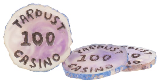 Three "Flintstones" $100 Tardust Casino Chips.