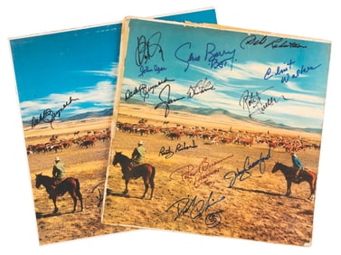 A Pair of Record Jackets Autographed By Western Stars.