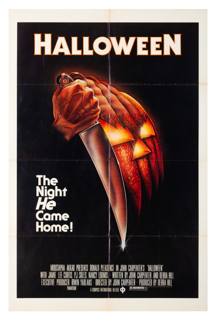 A "Halloween" One-Sheet Poster.: (Compass International Pictures, 1978) A one-sheet poster for the original theatrical release of “Halloween,” directed by John Carpenter. Measuring 27” x 41”, the poster is in good