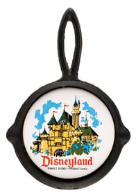 A 1960s Disneyland Cast Iron & Tile Miniature Skillet.