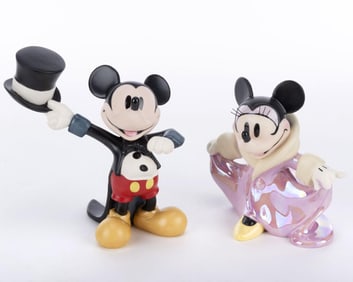 A WDCC Mickey and Minnie Figurine Set.