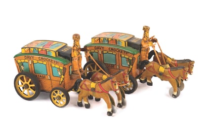 A Pair of 1950s Davy Crockett Stagecoach Tin Toys.