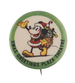 An Xmas Mickey Mouse Plaza Theatre Button.