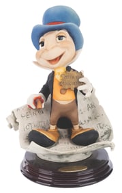 A Giuseppe Armani Jiminy Cricket Sculpture.
