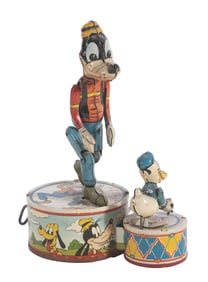 A Marx Donald Duck Duet Wind-Up Toy.