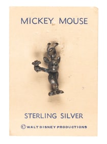 A Mickey Mouse Sterling Silver Charm.