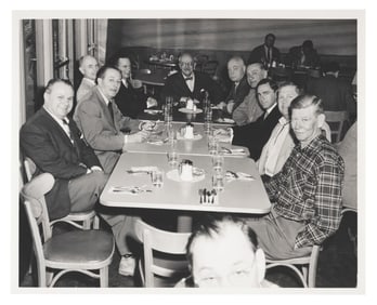 A Photo of Walt Disney with Max Fleischer and Animators.