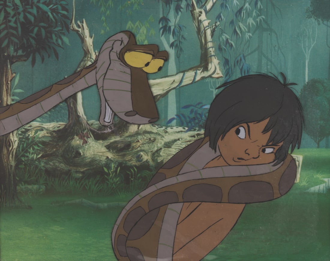 A Mowgli and Kaa Multi-Layer "The Jungle Book" Cel.: (Disney, 1967) An original Mowgli and Kaa multi-layer production cel from “The Jungle Book,” with a color copy background. The piece was sold at the Disneyland Art Corner and retains the origi