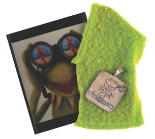 A Kermit Fabric Sample, Photo Transparency, and Crew Gift.