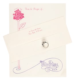 A Miss Piggy Prop Ring and Themed Studio Stationery.