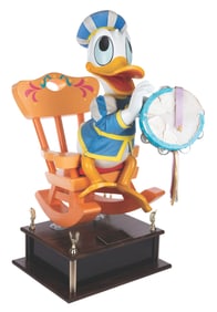 A Donald Duck with Tambourine Disney Store Display Figure.
