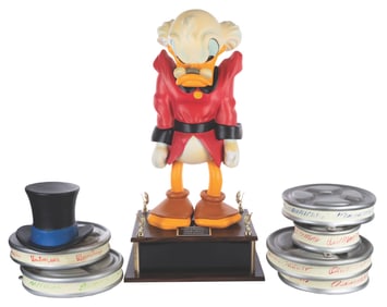 An Uncle Scrooge McDuck Disney Store Display Figure.