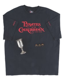 “Pirates of the Caribbean" Treasure Props and a Cast Member Crew Shirt.