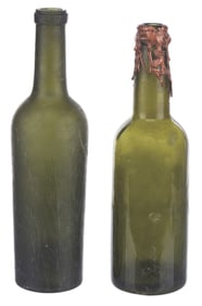 A Pair of “Pirates of the Caribbean" Prop Rum Bottles.