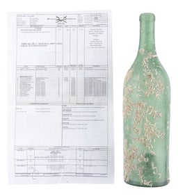 A “Pirates of the Caribbean" Call Sheet and Prop Rum Bottle.