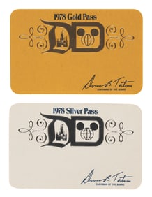 A Pair of Unused Gold and Silver Disney Park Passes.