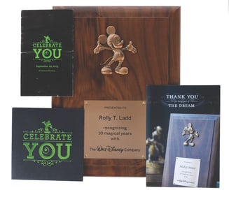 A 10 Year Service Award Mickey Mouse Plaque.