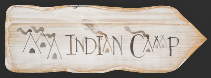 A Never Land Pool “Indian Camp" Directional Sign.