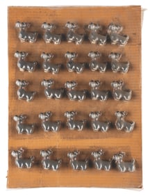 A Set of Shrink-Wrapped "Lady and the Tramp" Jock Figures.