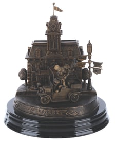 A Disneyland 50th Main Street Figurine by Larry Nikolai.