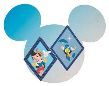 A Disneyland 60th Pinocchio and Jiminy Cricket Sign.