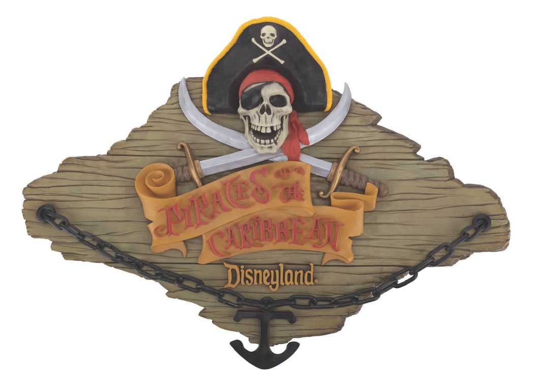 A Pirates of the Caribbean Talking Wall Plaque.: (Disney, 2003) A hand-painted Pirates of the Caribbean talking plaque, numbered 222 in a limited edition of 500. Requiring three AA batteries (not included), the audio function did not work when teste