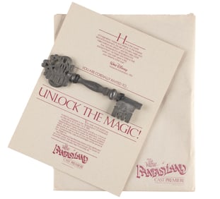 A New Fantasyland Cast Premiere Invitation and Key.