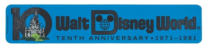 A Walt Disney World 10th Anniversary Bumper Sticker.