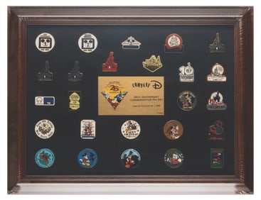 A Walt Disney World Cast Member 25th Anniversary Pin Set.