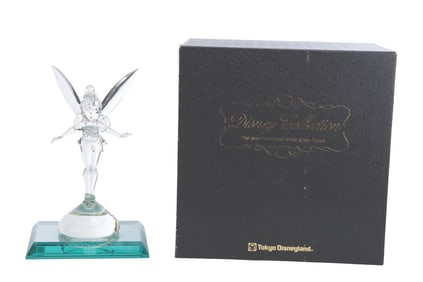 A Tokyo Disneyland Exclusive Glass Tinker Bell Figure.