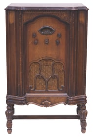 A Silvertone 8-Tube Battery Radio.