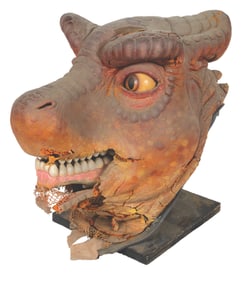 A "Crash the Curiousaurus" Puppet Head.