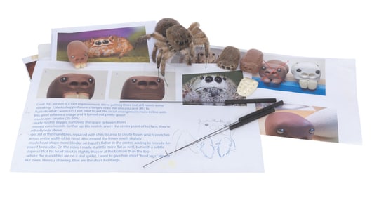 A "Marcel the Shell with Shoes On" Spider Puppet.