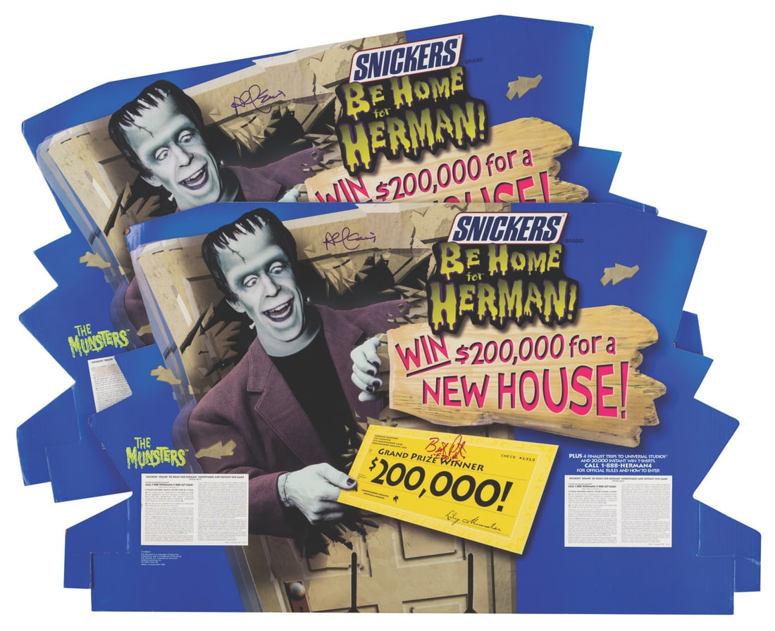 A Pair of Signed "The Munsters" Snickers Sweepstakes Displays.: (Universal/Mars, 1998) A pair of store displays for the Snickers "Be Home for Herman" sweepstakes signed by Al Lewis (Grandpa) and Butch Patrick (Eddie) from "The Munsters." The sweepstakes offered th
