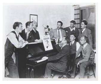 A Photo of Walt, Carl Stalling, and Animators.