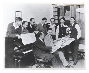 A Group Photo of Walt, Carl Stalling, and Animators.