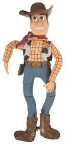 A Four Foot Tall Woody "Toy Story" Doll.